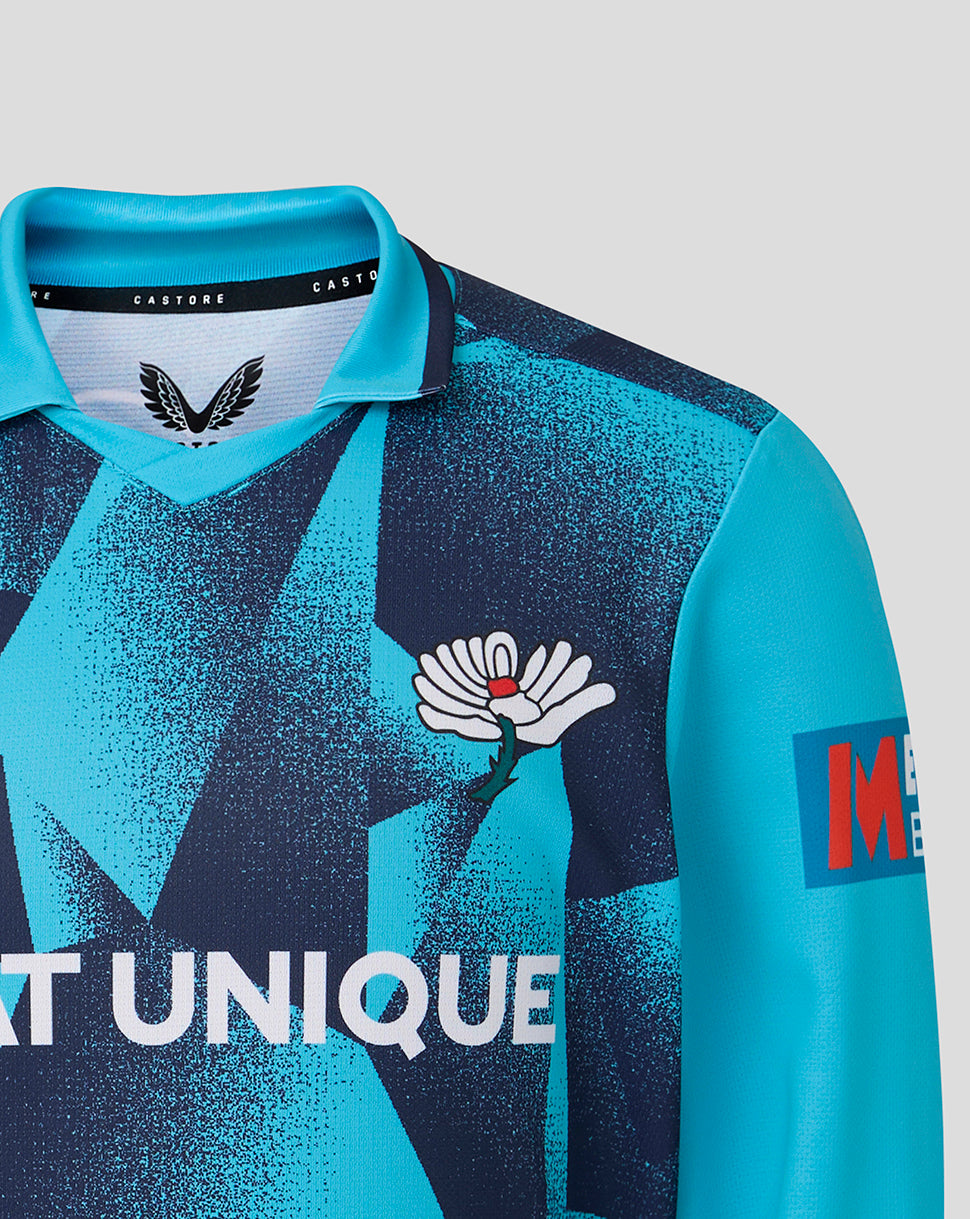 Teal and navy sports jersey with branding and text on a light gray background