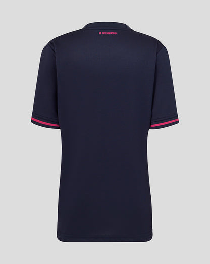 Navy blue polo shirt with pink accents on a light gray background