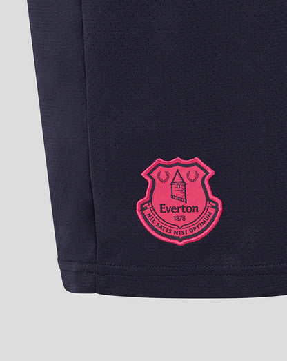 Navy shorts with a pink crest logo on a light gray background