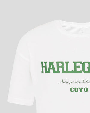 White t-shirt with green text on a light gray background