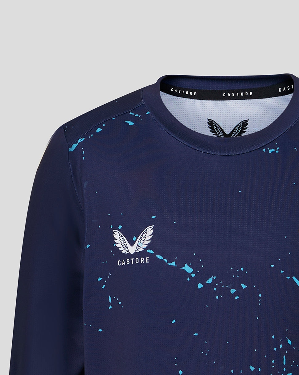 Navy blue sweatshirt with blue splatter pattern and Castore logo on a light gray background