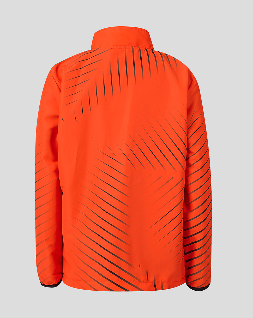 Back view of the orange Sunrisers Leeds The Hundred woven pre match jacket with diagonal black stripes