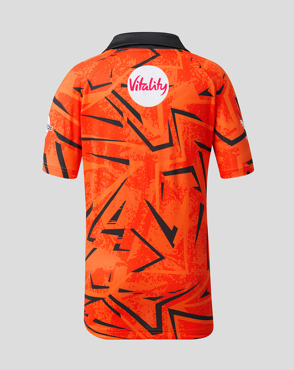 Back view of the orange junior Sunrisers Leeds The Hundred jersey with Vitality sponsor on the back