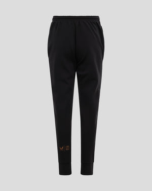 Back view of black Leverkusen travel pants with elastic waistband.