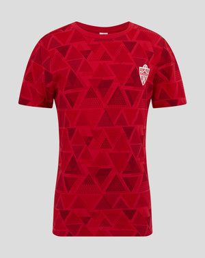 Red Almeria junior short sleeve pajama top with bold geometric triangle pattern and crest