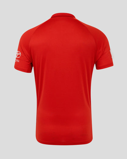 Red polo shirt with the Toyota logo on the sleeve against a gray background