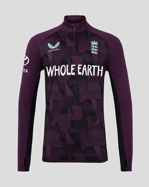 Purple athletic long-sleeve shirt with 'Whole Earth' branding on a gray background
