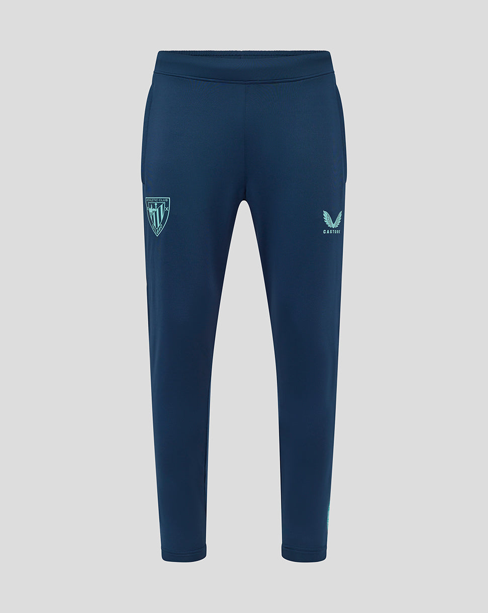 Front view of navy Athletic Club men's training pants with crest on the left thigh and Castore logo on the right thigh