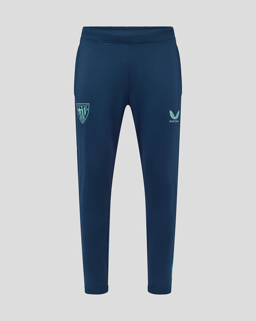 Front view of navy Athletic Club men's training pants with crest on the left thigh and Castore logo on the right thigh