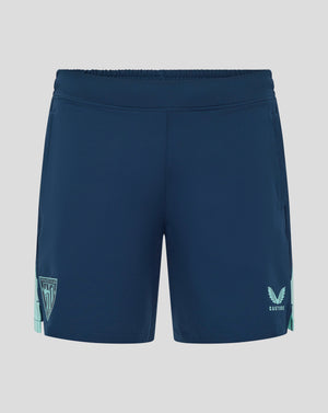 Back view of navy athletic shorts with elastic waistband, featuring Athletic Club shield badge on left leg and Castore wings logo on right.