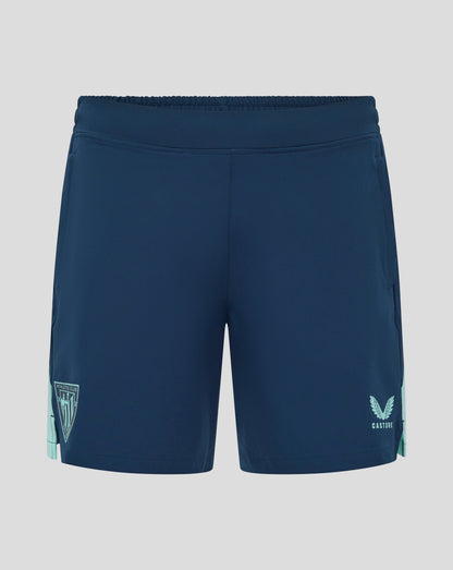 Back view of navy athletic shorts with elastic waistband, featuring Athletic Club shield badge on left leg and Castore wings logo on right.