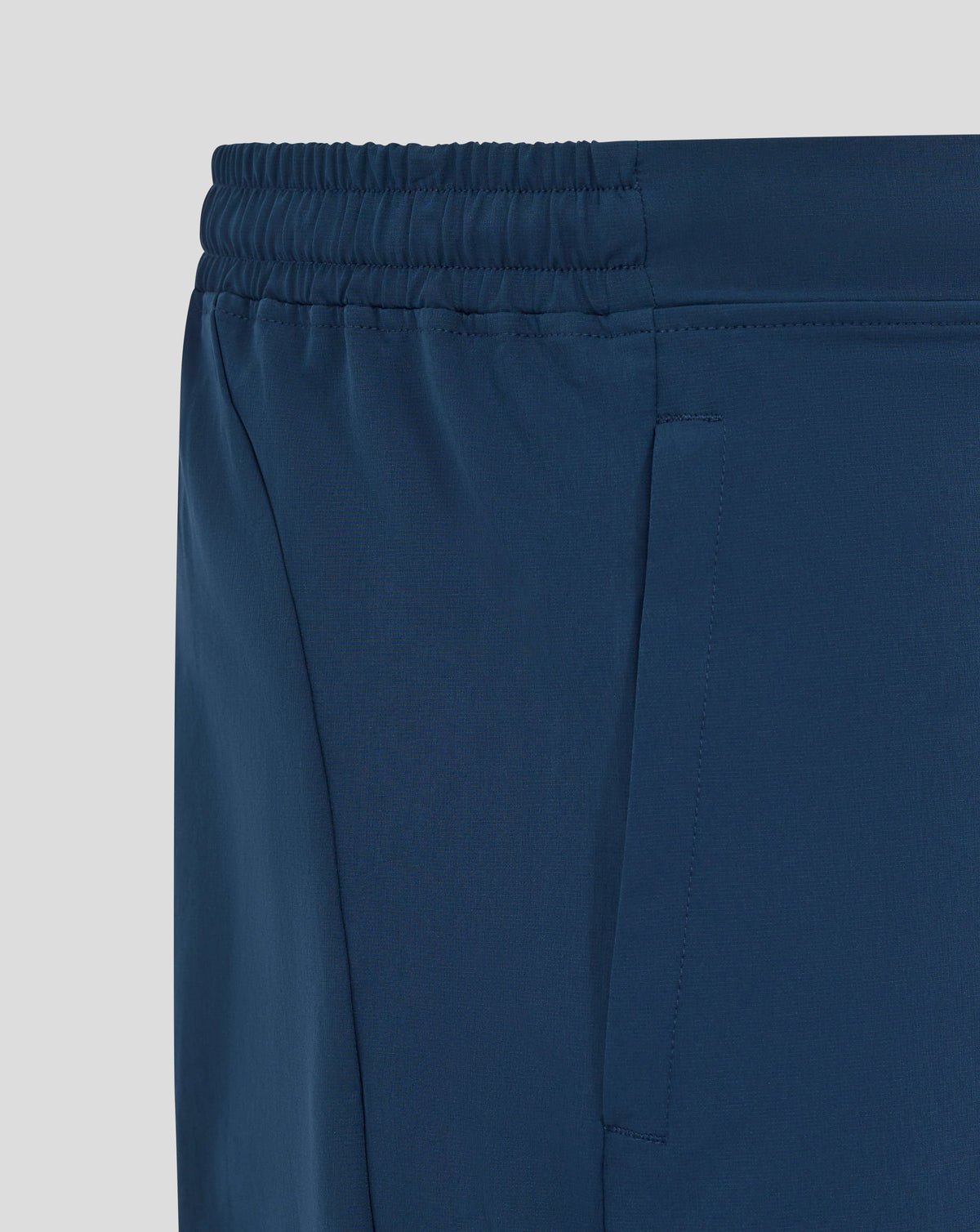 Athletic Club men's blue 25/26 presentation shorts waistband close up showing elastic gathered band