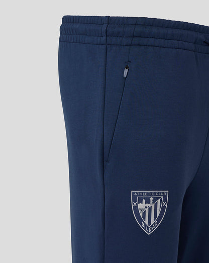 Navy Athletic Club men's travel knit pants with a zip pocket and club crest.