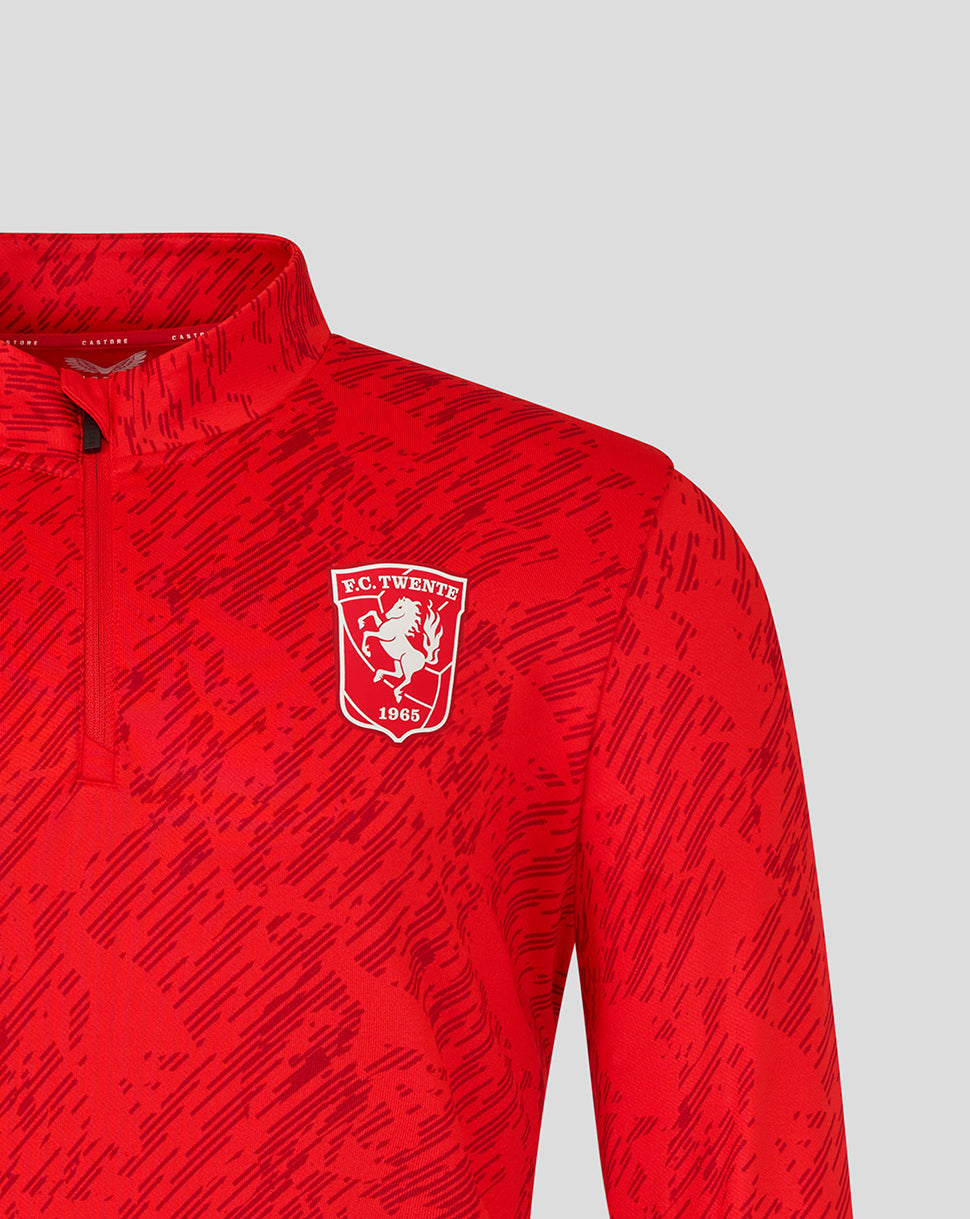 Red FC Twente matchday midlayer top with a front zipper and white crest on the chest.