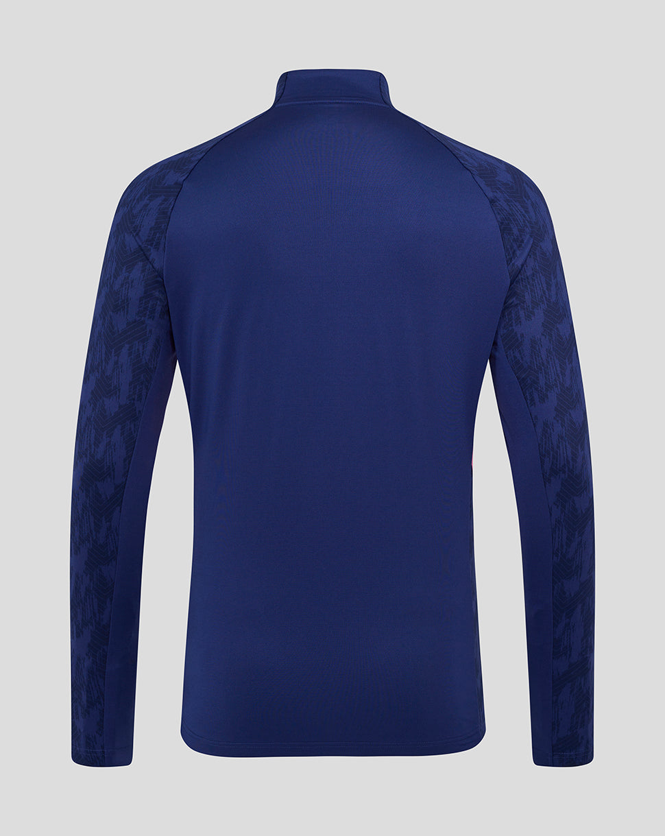 Back view of Feyenoord training midlayer in royal blue with patterned sleeves.