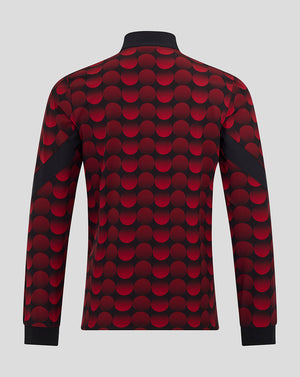 Back view of Feyenoord 2025-2026 Home Matchday Jacket with red dot pattern and black side panels.