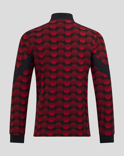 Back view of Feyenoord 2025-2026 Home Matchday Jacket with red dot pattern and black side panels.