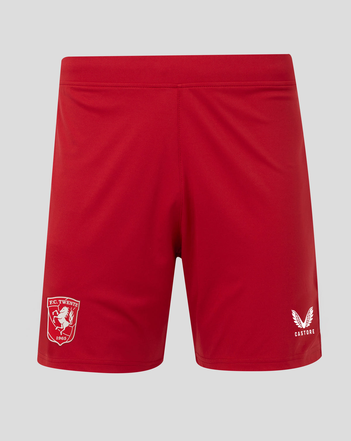 Red FC Twente home shorts with elastic waistband, crest on the left leg and Castore logo on the other leg