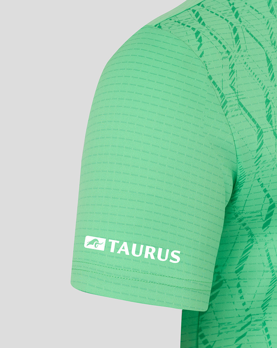 Close up of the sleeve on a light green FC Twente goalkeeper shirt featuring the Taurus logo