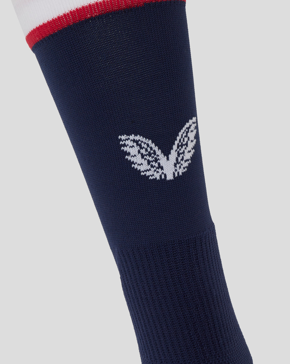 Back view of navy England Rugby Home Mid Calf Sock with white logo pattern and striped cuff detail