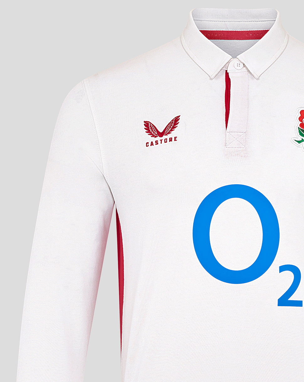 Close-up of white rugby shirt front with large blue O2 logo center rose crest and Castore badge on chest