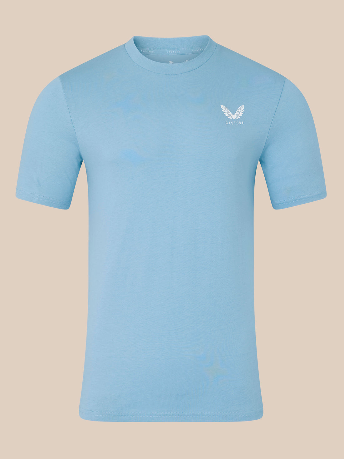 Light blue t-shirt with a logo on a beige background