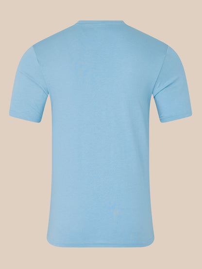Light blue t-shirt on a beige background