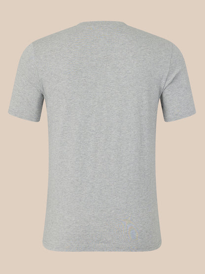 Gray t-shirt on a beige background