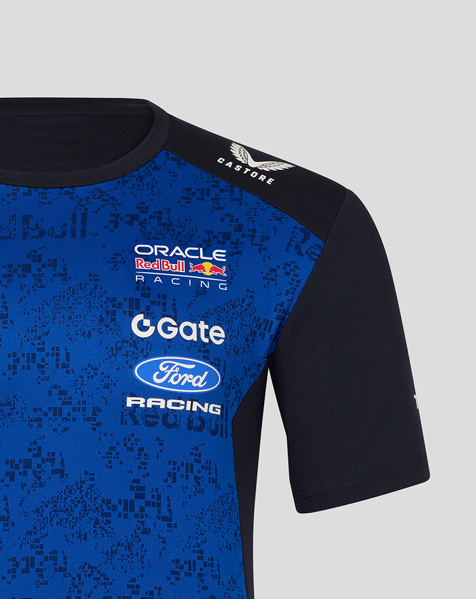 Blue and black sports jersey with various brand logos on a gray background