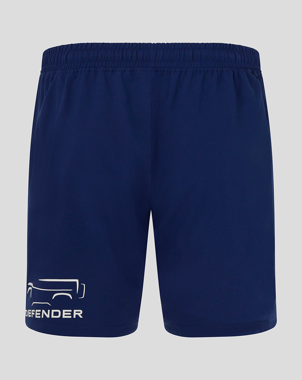 Navy blue shorts with a brand logo on a light gray background