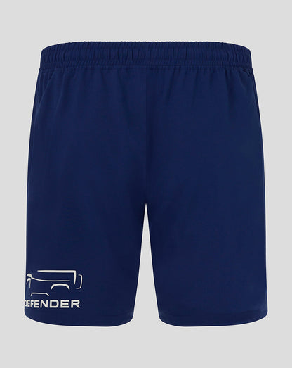 Navy blue shorts with a brand logo on a light gray background