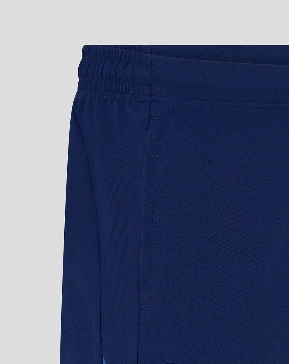 Navy blue pants on a light gray background