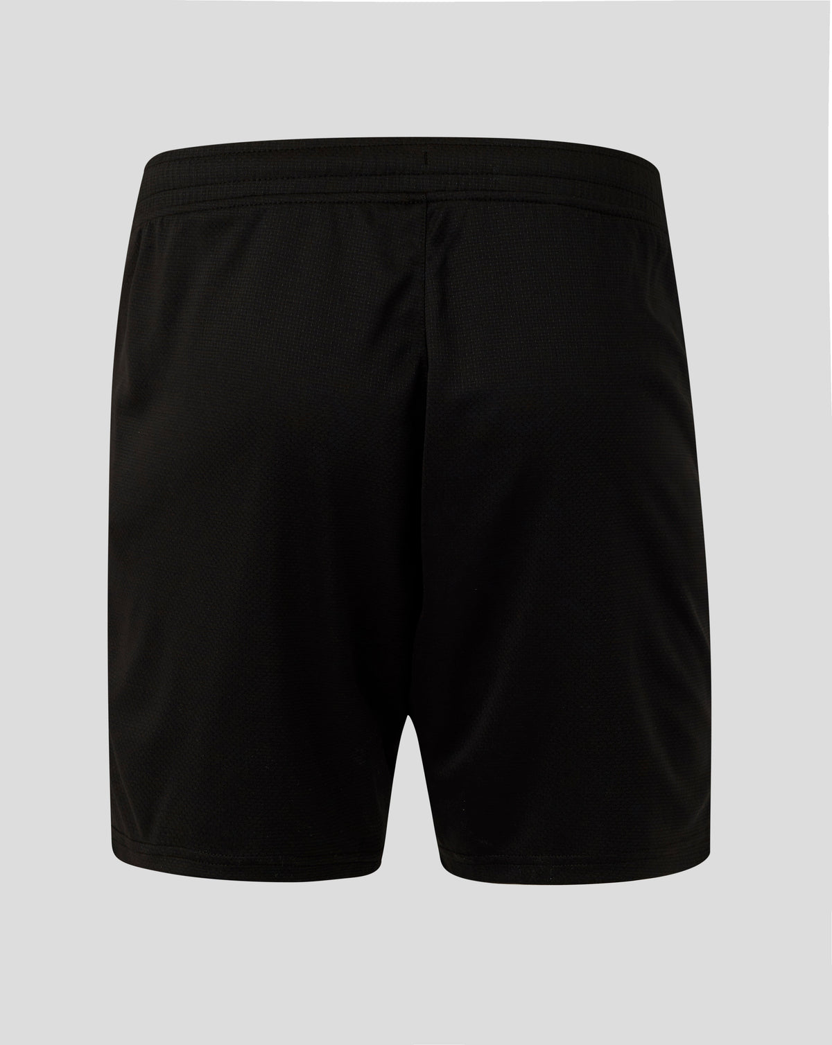 Back view of black Athletic Club Fourth Shorts with a subtle textured fabric and elastic waistband.