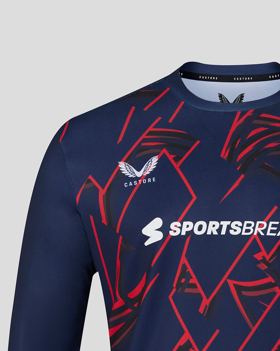 Navy sports jersey with red and white patterns on a gray background