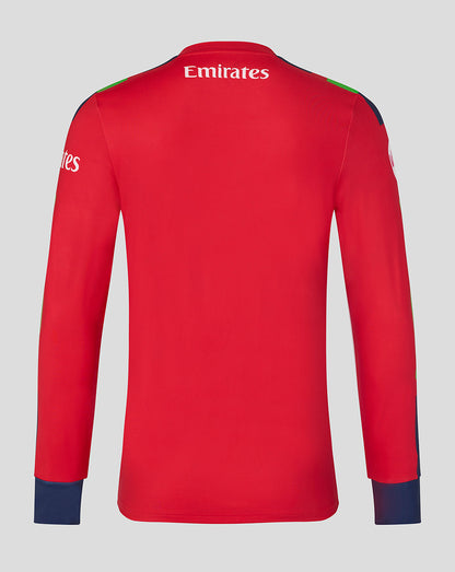 Red long-sleeve shirt with Emirates logo on a gray background