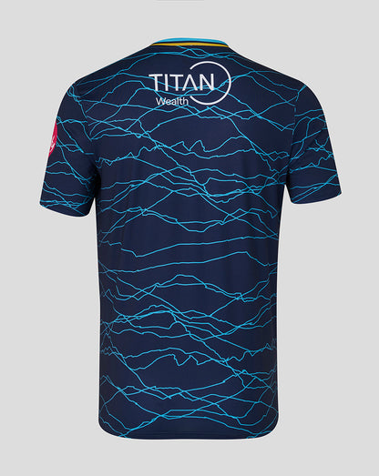 Navy blue sports jersey with blue lightning pattern on a gray background