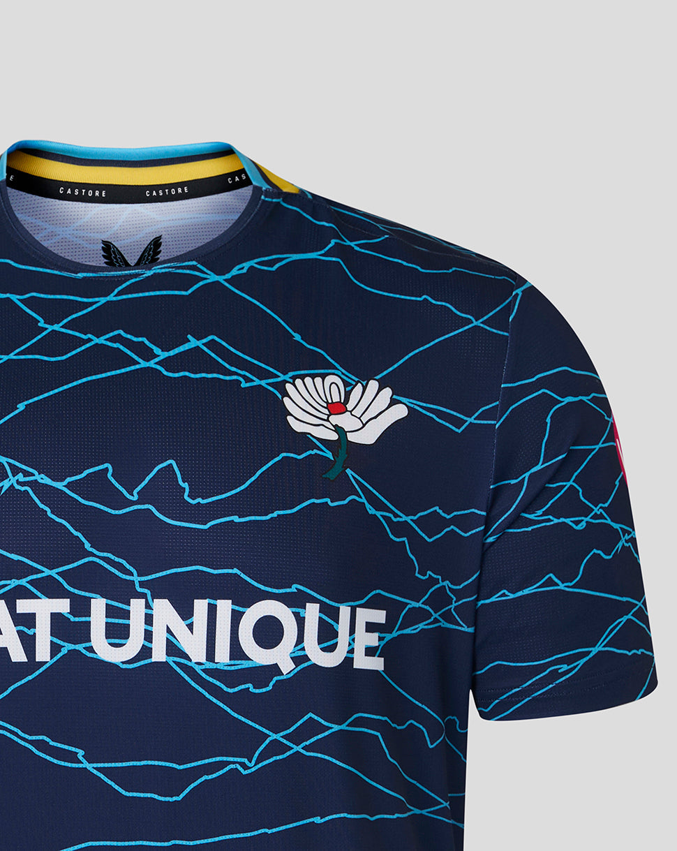Navy blue sports jersey with blue patterns and a logo on a gray background