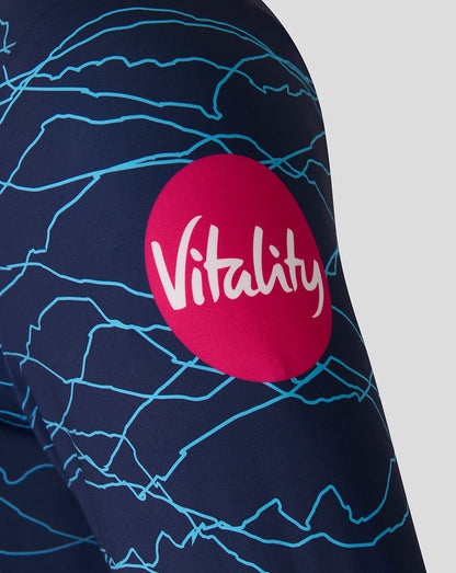 Navy blue sleeve with white abstract patterns and a red circle with 'Vitality' logo on a light gray background