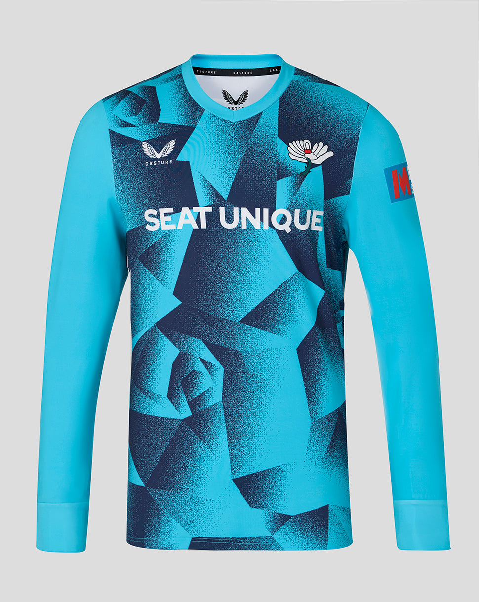 Blue sports jersey with geometric pattern and visible branding on a light gray background