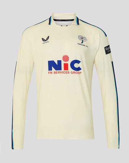 Cream-colored sports jersey with branding on a light gray background