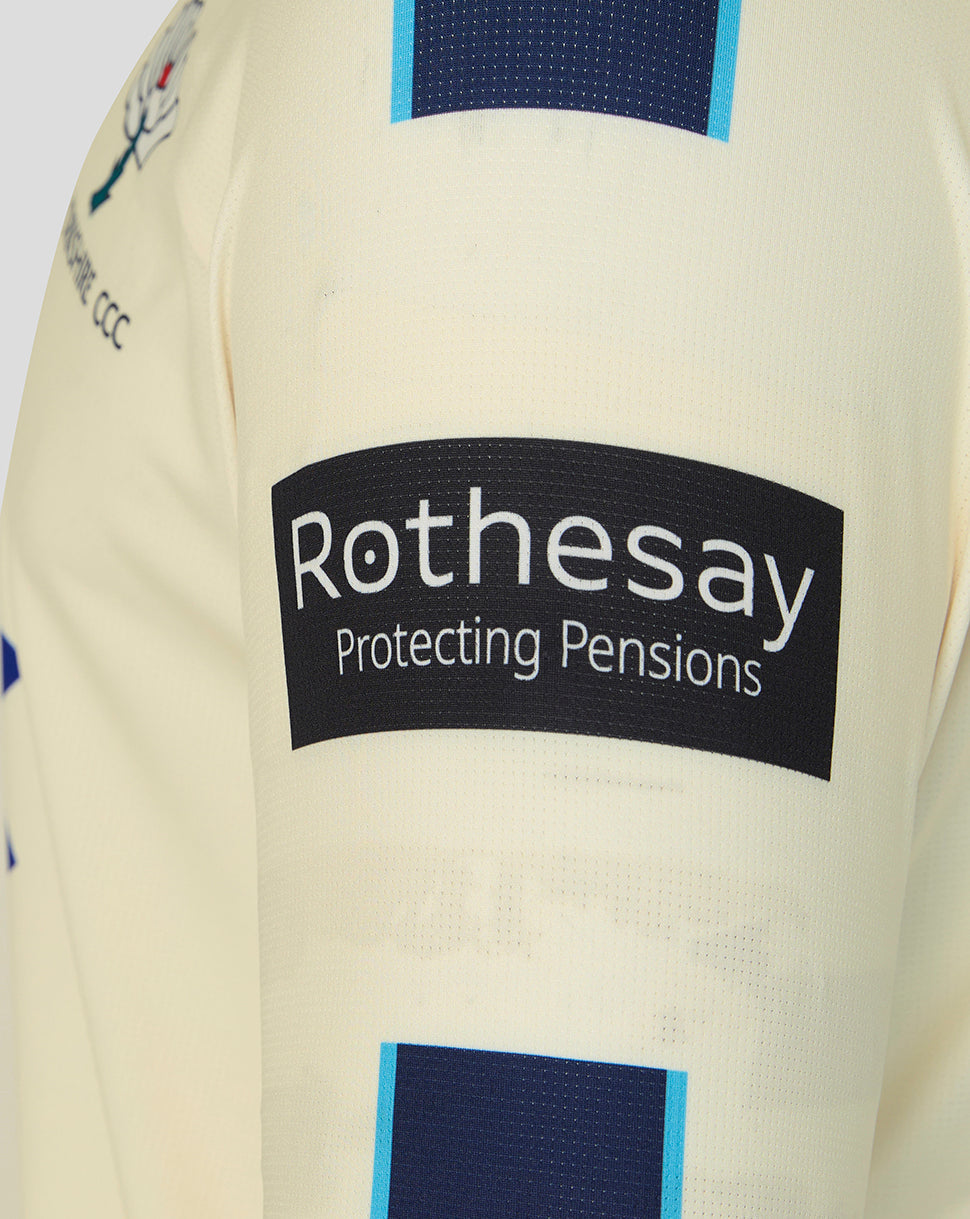 Close-up of a sports jersey with 'Rothesay' logo on a white background
