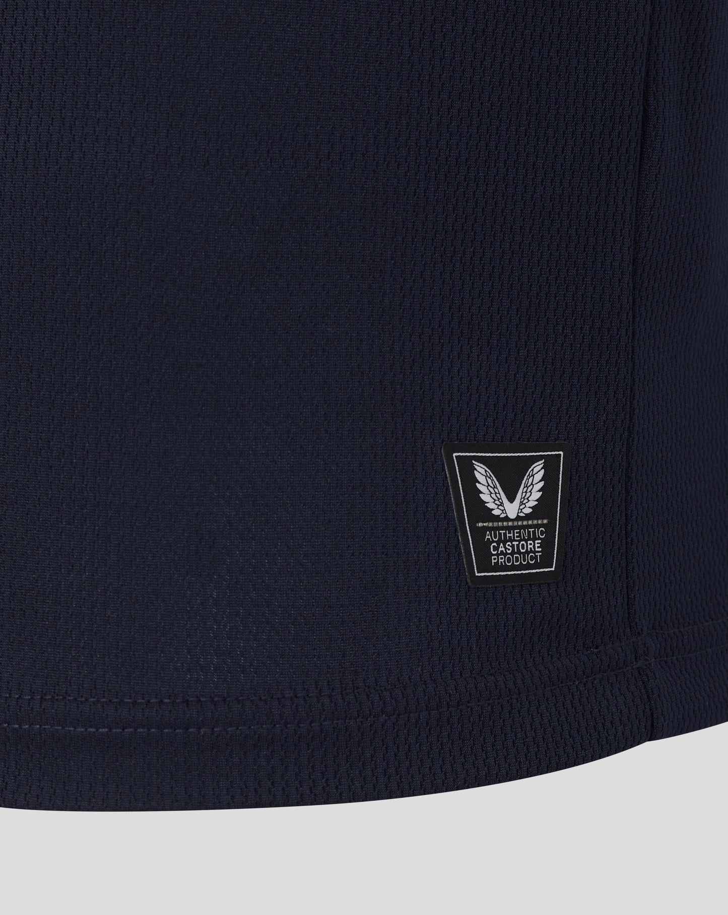 Navy blue shorts with a brand logo on a light gray background