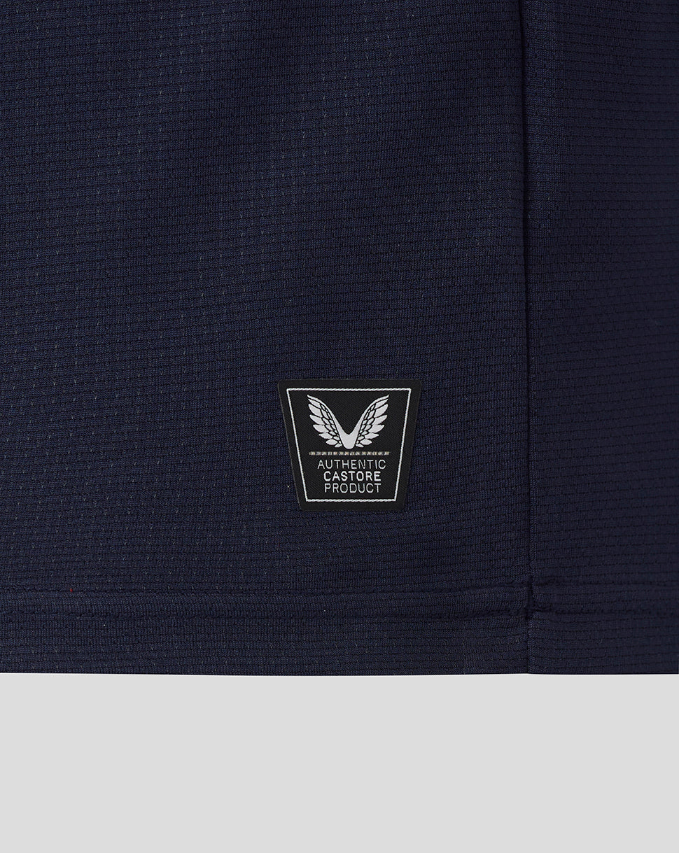 Navy blue fabric with a logo patch on a white background