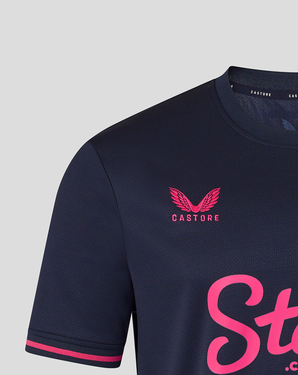 Navy blue sports jersey with pink 'Castore' logo on a light gray background