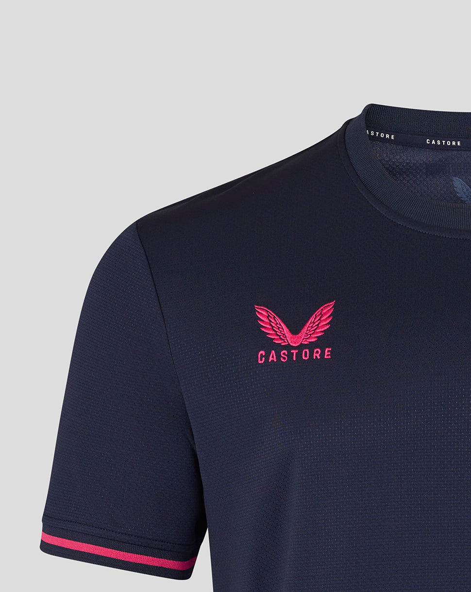 Navy blue t-shirt with pink logo and text on a light gray background