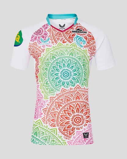 Colorful mandala-patterned shirt on a white background