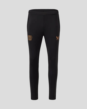 Black Bayer 04 Leverkusen training pants with pockets, featuring a gold club crest on the left leg and a Castore logo on the right.