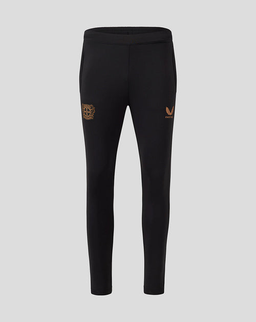 Black Bayer 04 Leverkusen training pants with pockets, featuring a gold club crest on the left leg and a Castore logo on the right.