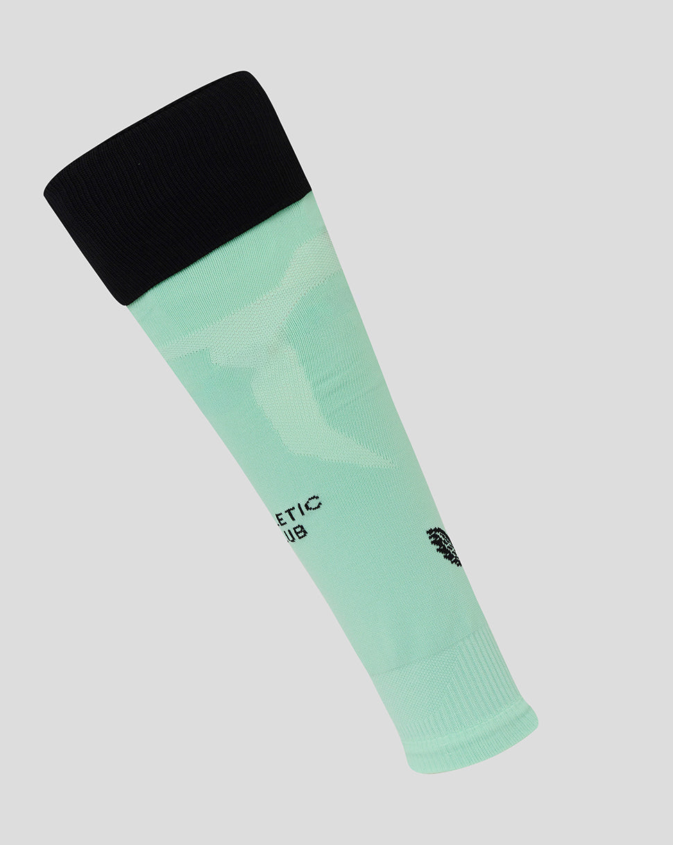 Mint green Athletic Club third footless sock with black fold-over cuff and shin branding.