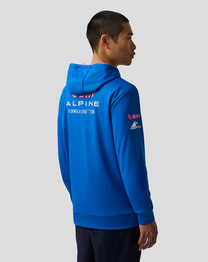 Blue BWT Alpine Formula One Team zip hoodie shown on a model angled back view with Alpine branding across the back